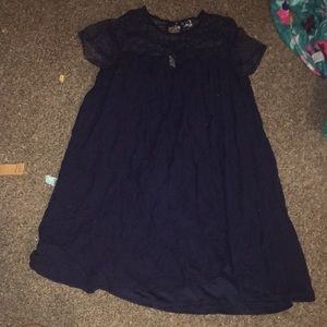 Dark blue long shirt.